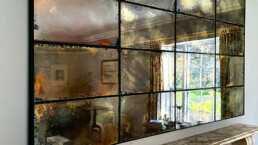 Framed antique mirror glass feature wall by Devlin In Design decorative artists.