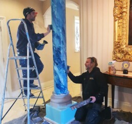 Marbling the pillars and creating the faux finish for a blue marble to the columns.