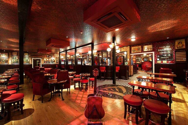 Distressed ceiling faux finish in red leather by Devlin In Design Northern Ireland.