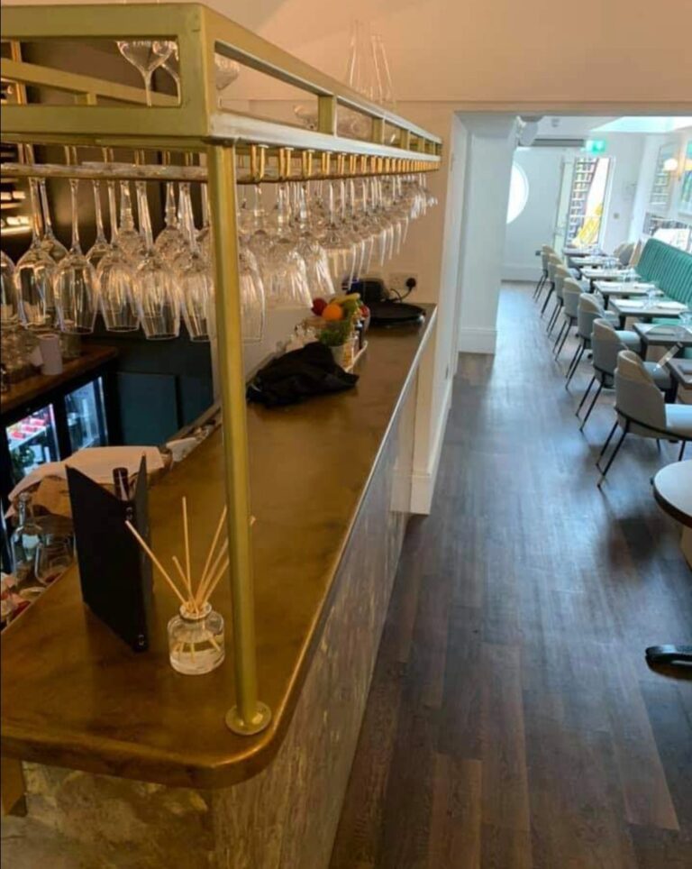 Gold Patina Liquid Metal Bar Counter Top With Polished Plaster Facade