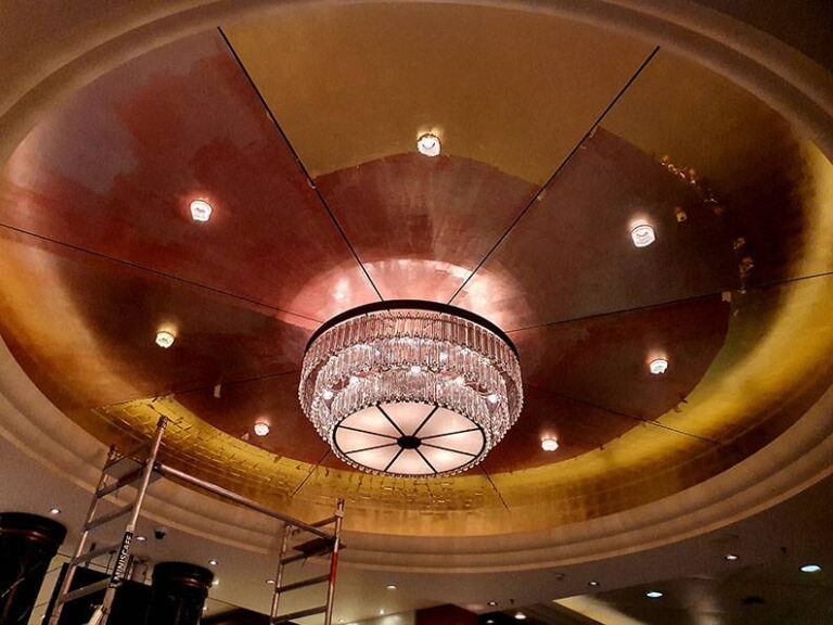 Gold leaf gilding to the ceilings of the Queen Mary Cruise Ship. Cunard.