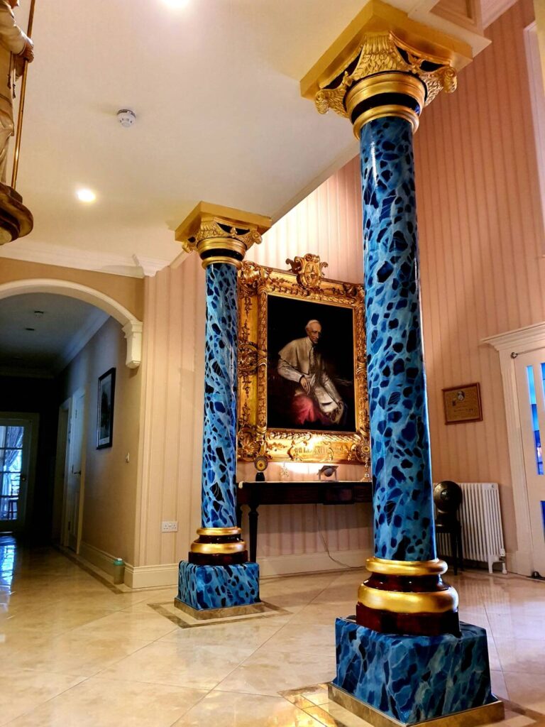Marbled And Gilded Pillars In Private Residence.